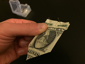 folded dollar bill for money tree