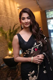 Pooja Hegde Saree Stills at Acharya Movie Press Meet