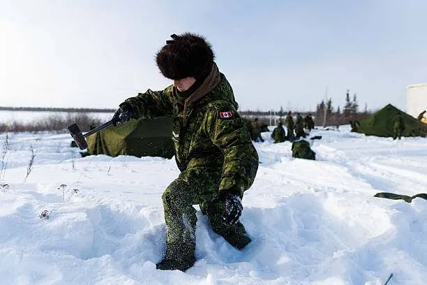 Canadian soldiers from the 5th Canadian Division set up camp during Operation Nanook, the Canadian Armed Forces' annual Arctic training and sovereignty mission, in Inuvik, Northwest Territories, Canada. Photo by Cole Burston/AFP