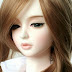 Cute Sad Doll Girl 240x320 Mobile Wallpaper