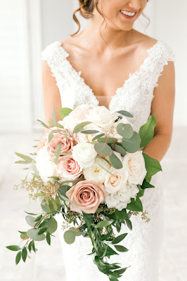 Bride in wedding gown with bouquet