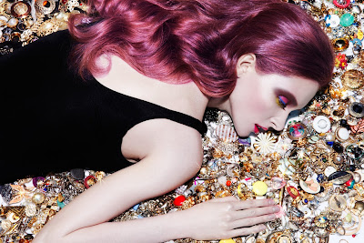 pink and purple hair, pastel hair, beauty photographer nyc, model laying in jewels, 