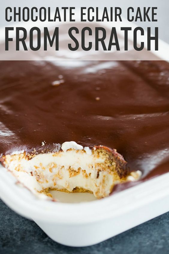 Chocolate Eclair Cake (From Scratch!) :: Layers of graham crackers with homemade vanilla pudding lightened with homemade stabilized whipped cream, and topped with chocolate icing. A wonderful summer dessert! #browneyedbaker #nobake #nobakedessert #iceboxcake #puddingrecipe #chocolateicing via @browneyedbaker