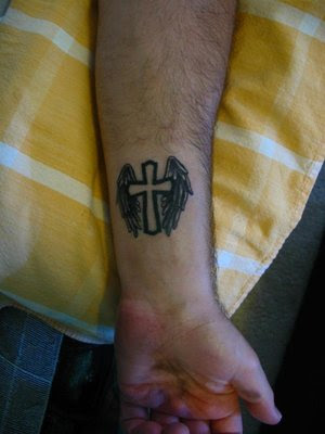 Tiny cross with wing tattoo Celtic cross tattoos designs for men