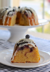 Food Lust People Love: This Lemon Blueberry Van Halen Bundt is a rich and buttery pound cake, filled with cream cheese and blueberries then drizzled with a lemon cream cheese glaze.