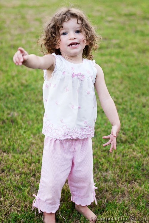 Abby playing with lawn chair and in carport blog-14