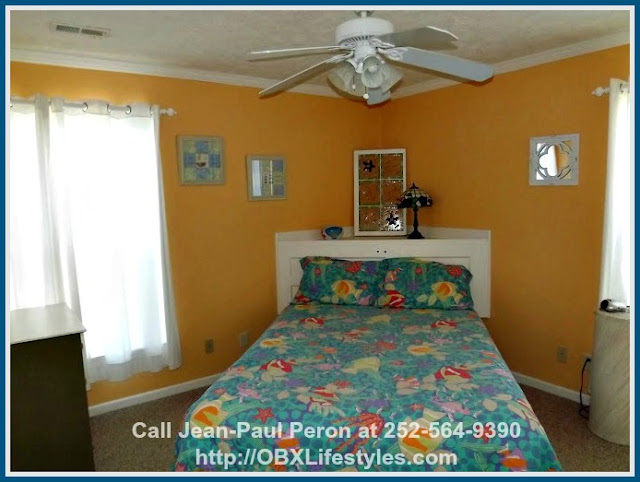 When not in use, you can turn any of the beautiful 6 bedroom canal front Corolla NC home for sale's rooms into your very own hobby room - for music, painting, writing, and more!