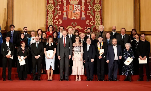 Queen Letizia wore a Finale eggshell floral embroidery tulle midi dress by Temperley London. Tous Beethoven earrings. Magrit