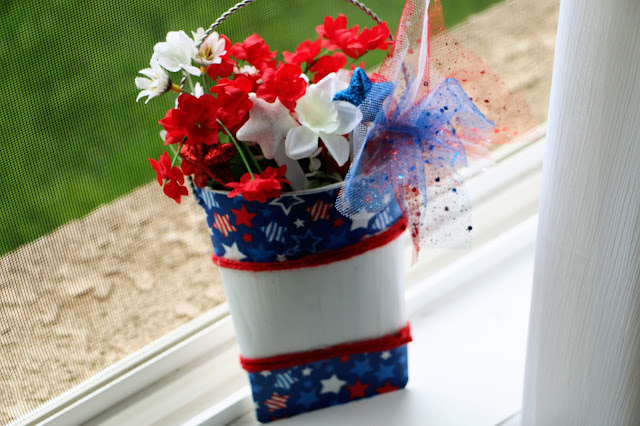 Completed hanging 4th of July metal hanging design displayed on a windowsill