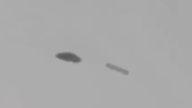 Cigar shape UFO filmed by eye witnesses on Earth and in a unique way.