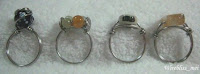 Wire wrapped rings with 20g stainless steel wire. Stones consist of rutilated quartz, jade, agate and Chinese porcelain beads