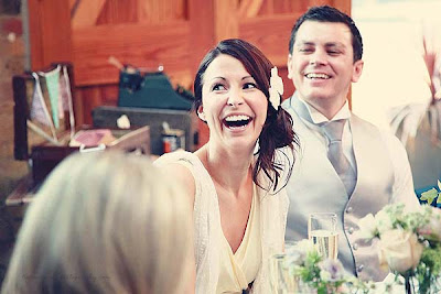 bride laughing during speeches at St Chads place