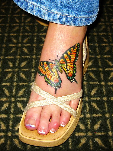 butterfly tattoos on feet. Butterfly Foot Tattoos