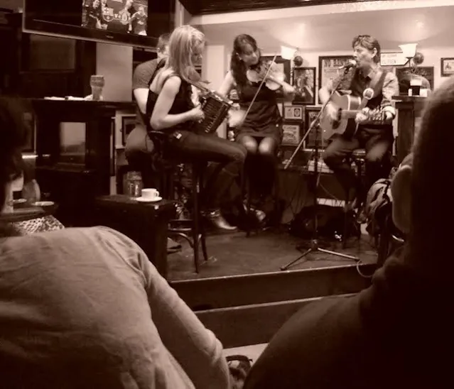 Black and white photo of Irish Trad music performers at the Old Storehouse in Dublin