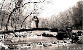 Bride and groom on bridge