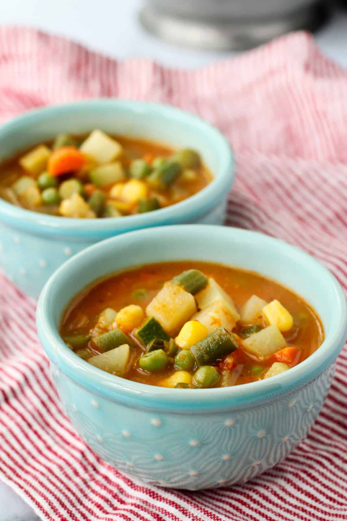 Mexican Vegetable Soup with Chipotles in bowls.