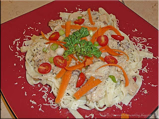 homemade fettucine with creamed turkey sauce