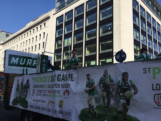 Pic of Irish Rugby float with banner for special St Patrick's Day game