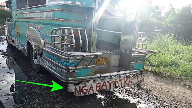 a jeep's mud flap is written with "Nga Bayot Ka"! meaning "You Faggot"!
