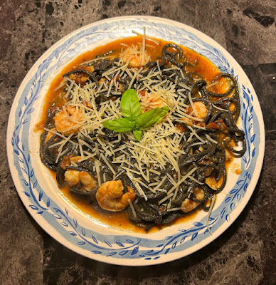 Shrimp marinara tossed with squid ink linguine