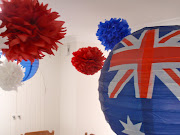 . some Australia flag themed table decor like the plastic table cloths, .