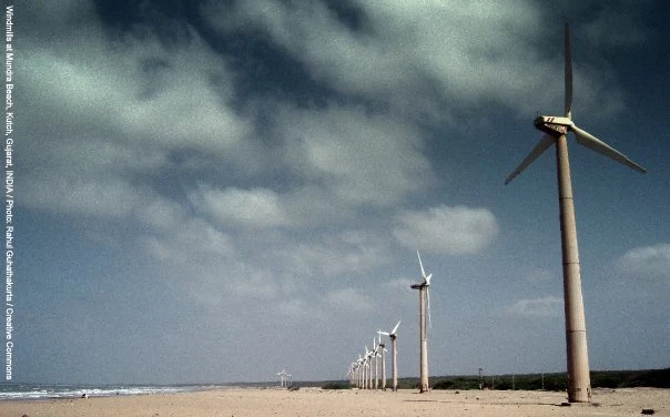 Image Attribute: Windmills at Mundra Beach, Kutch, Gujarat, India / Photo by Rahul Guhathakurta / Creative Commons 2.0 CC-BY