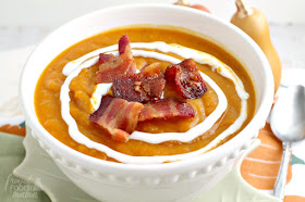 Roasted butternut squash & creamy pumpkin are blended together with warm spices & a little kick of heat in this perfect for fall Chipotle Butternut Squash & Pumpkin Soup.