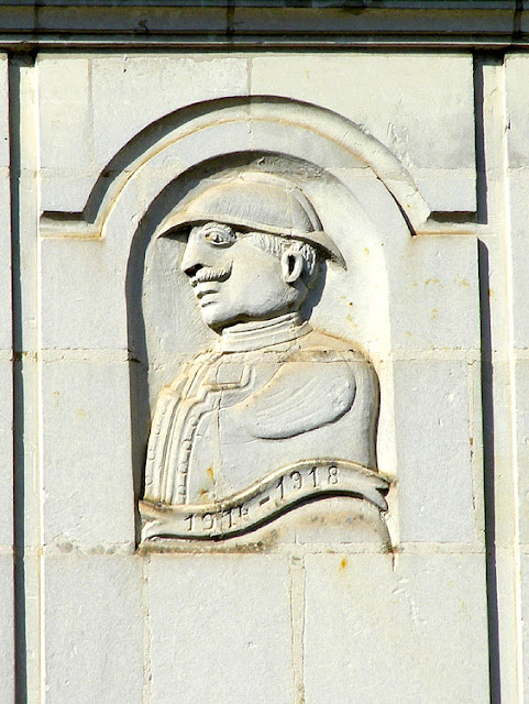 Folk art relief sculpture of a WWI soldier on a house, Indre et Loire, France. Photo by Loire Valley Time Travel.