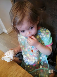 youngest enjoys her cake