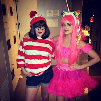 Lucy Hale and BFF Annie Breiter Halloween costumes. Pink unicorn. Where's Waldo