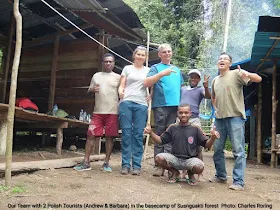 Two tourists from Poland with Charles Roring and his team