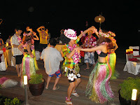 Hawaiian dancers having fun with the guests