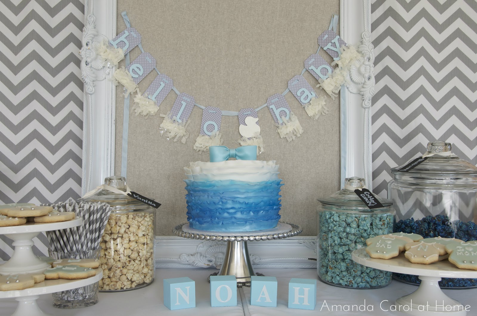 ... blue white and grey themed baby shower with pops of yellow duckies