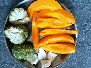 Sun cooked breakfast - Papaya, Custard Apple, Coconut