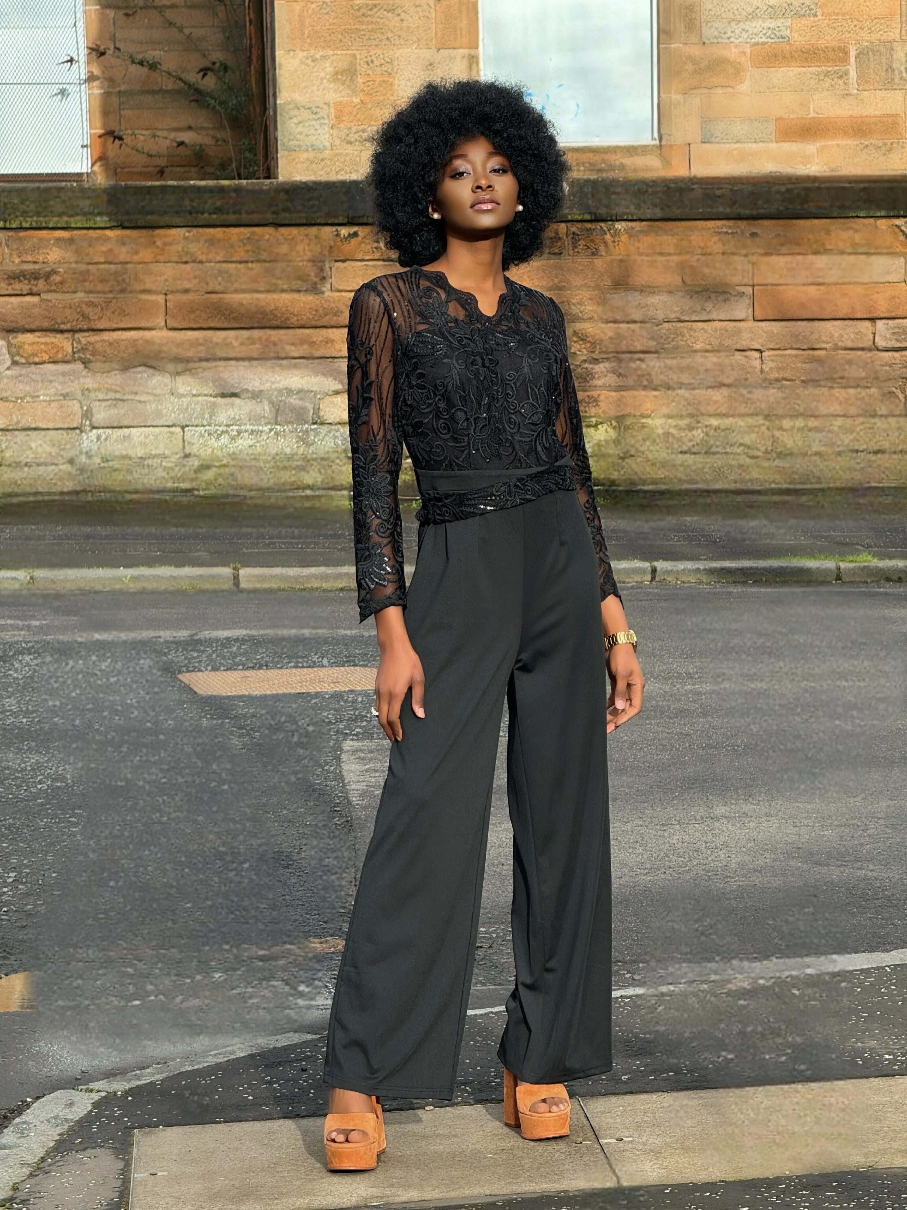 UK fashion blogger wearing a black jumpsuit