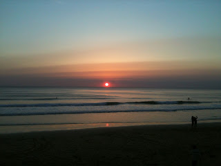 Sun setting over watergate bay Newquay Cornwall