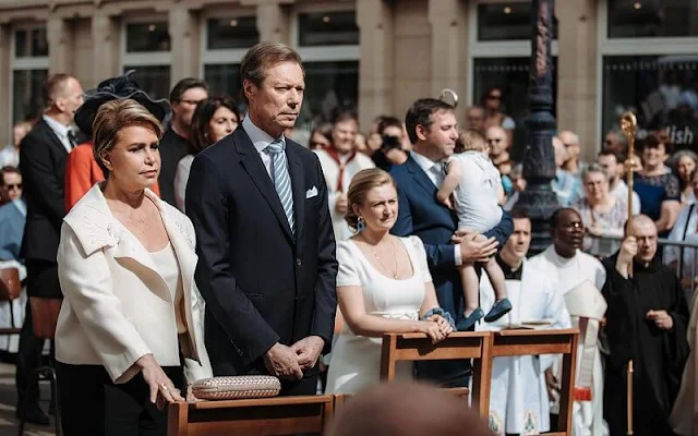 Maria Teresa wore a flower applique wool blend jacket by Valentino. Princess Stephanie wore a satin crepe dress by Paule Ka