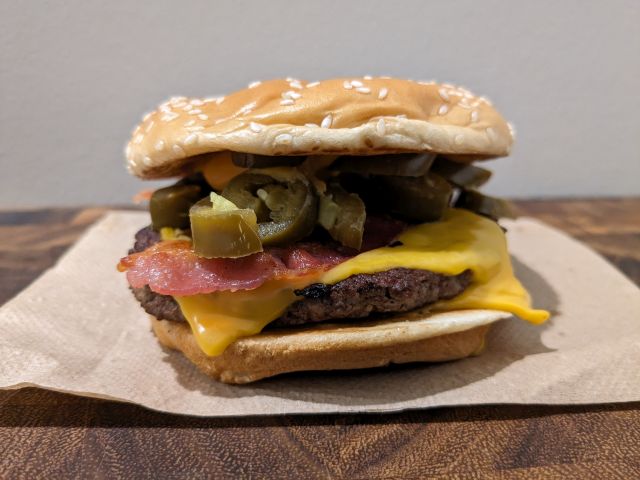 McDonald's Cheesy Jalapeno Bacon Quarter Pounder with Cheese side-view.