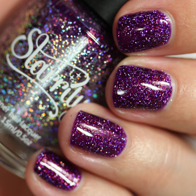 purple nail polish with holographic glitter and shimmer