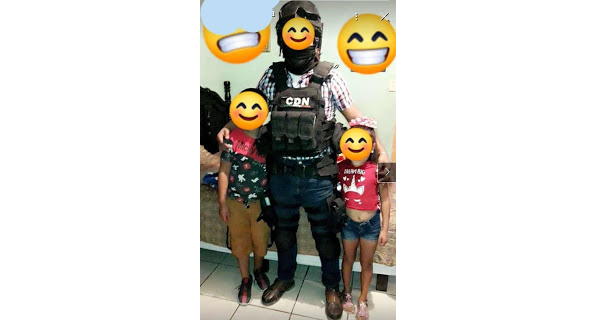 Sicario sin escrúpulos de Las Tropas del Infierno del CDN causa indignación , posa empechados con sus dos Chavitos