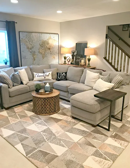 Family room in basement with large sectional 