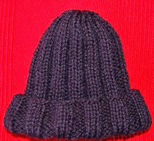 http://lanes-asgaya.blogspot.ch/2013/12/gorro-basico-tejido-dos-agujas.html