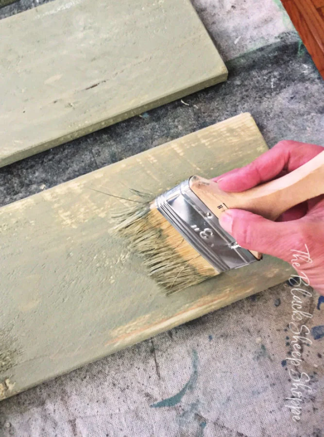 Here I am using a chip brush to quickly apply a base coat of paint.