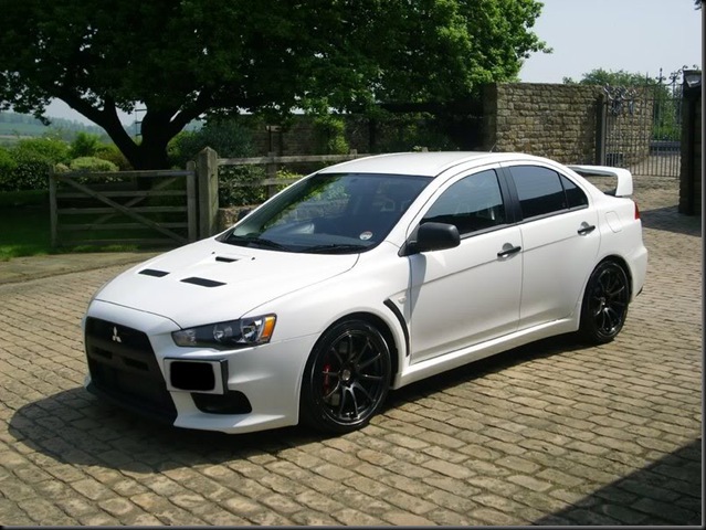 Mitsubishi Evo 9 White. Mitsubishi EVO X on Advan RS