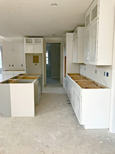 two tone kitchen with gray island 