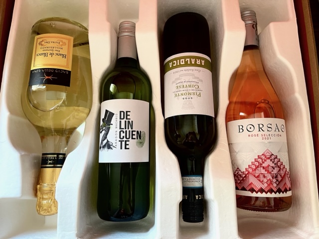 Four bottles of wine in a box