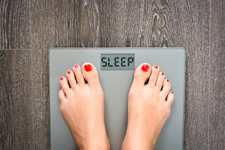 Picture of scale with the LED words showing SLEEP