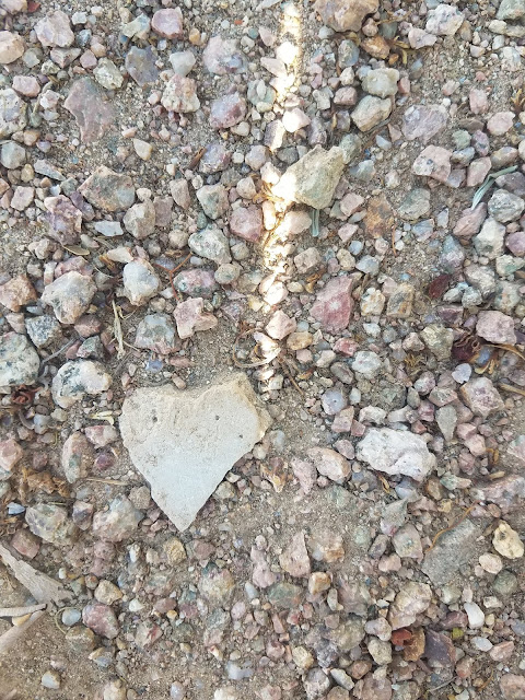 heart shape stone inlaid into gravel Micah Carling Photography