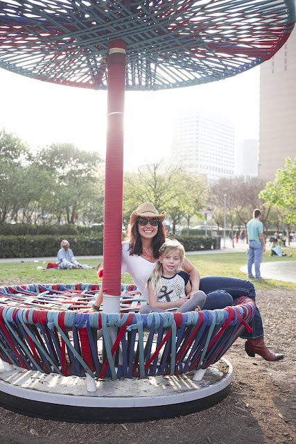 Amy West and daughter at Discovery Green in Houston