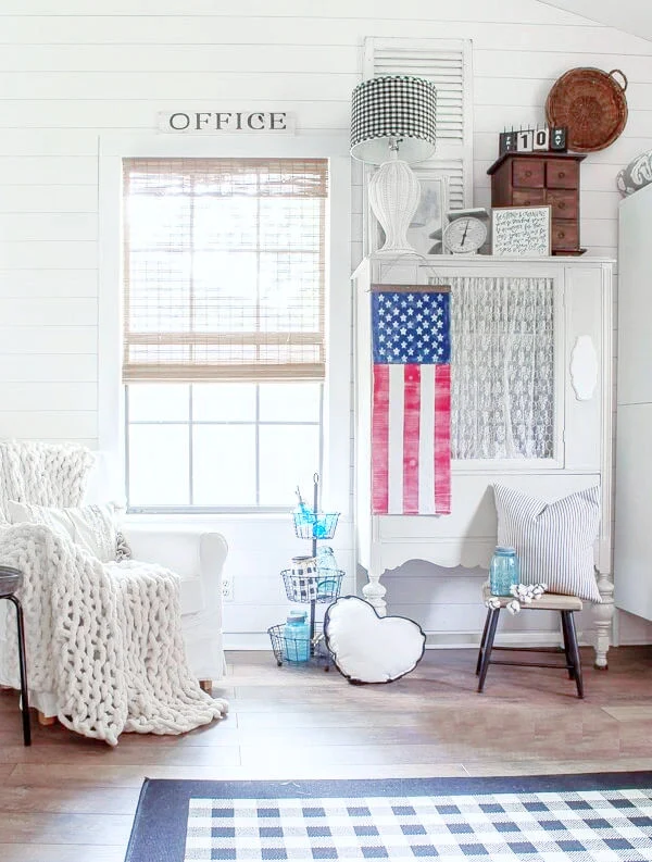 flag/banner hanging on vintage cabinet, shiplap walls